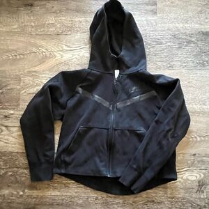 Women’s black Nike Tech